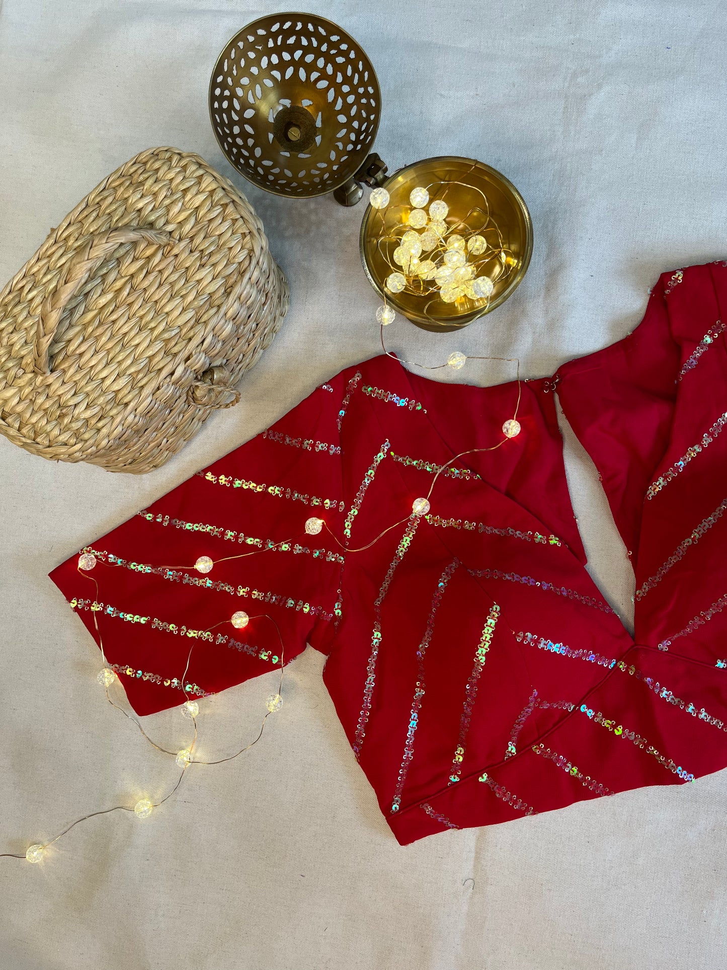 Geogette Geogette plunge neck sequence work in Ruby Red