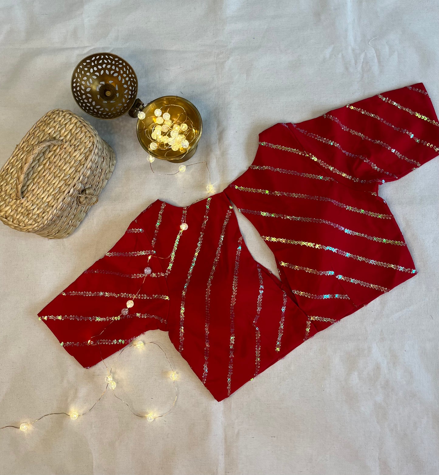 Geogette Geogette plunge neck sequence work in Ruby Red