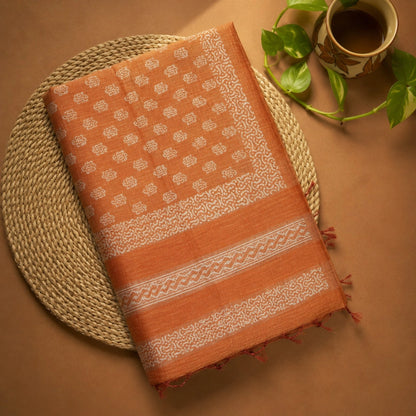 Burnt Orange Tussar Batik Saree with White Handcrafted Motifs and Tassel Pallu