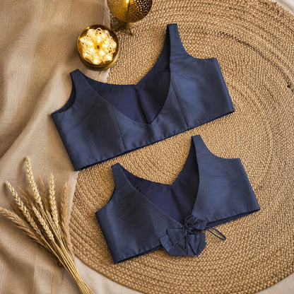 Navy Blue Solid Raw Silk Sleeveless Backless Blouse with V-Neck Tie-Up Design