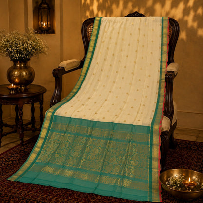 Ivory and Emerald Green Sico Gadwal Saree with Gold Zari Buti and Floral Pallu