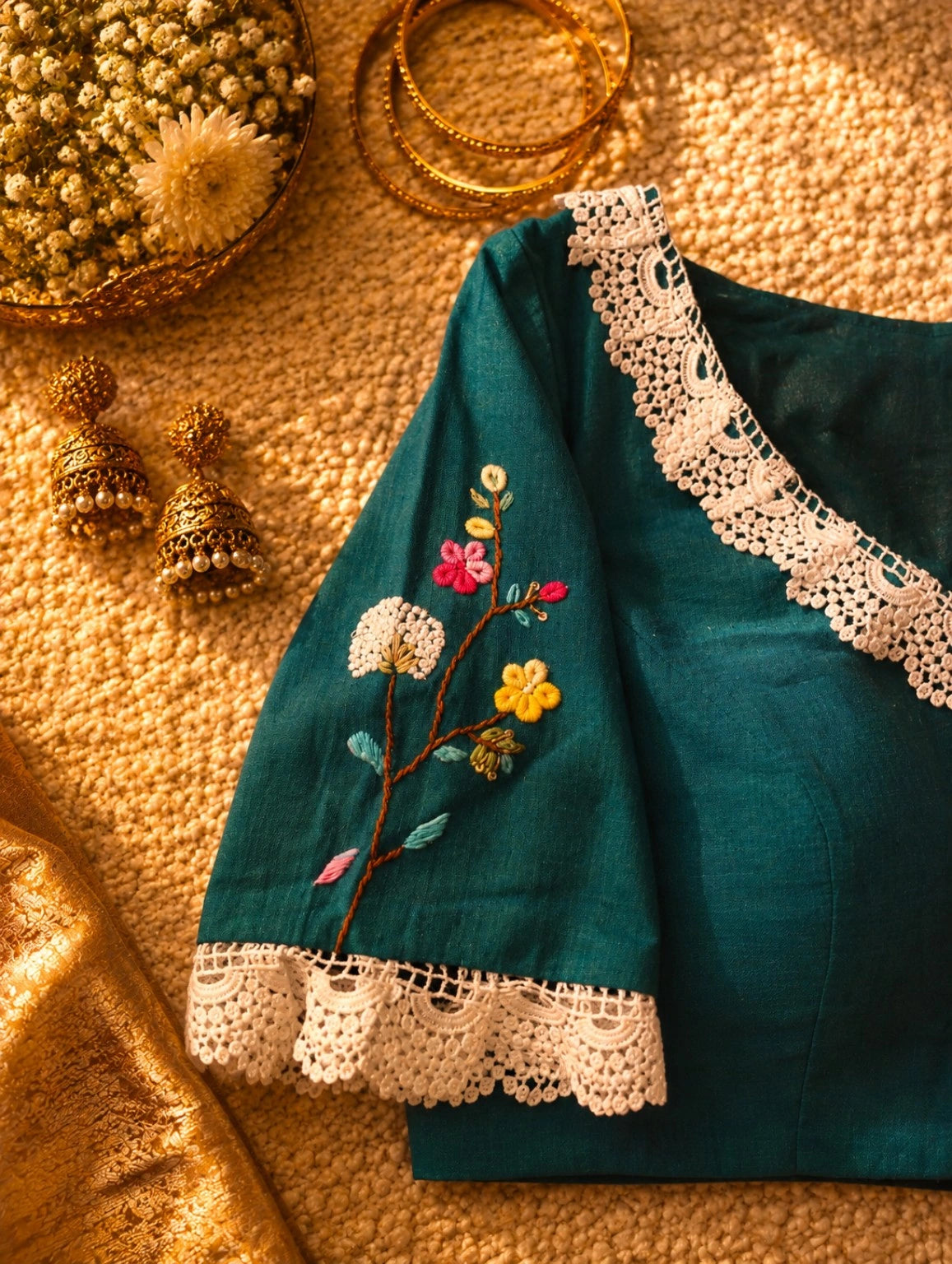 Teal Pure Cotton Air Neck Thread Work Blouse with Floral Embroidery & Crochet Lace