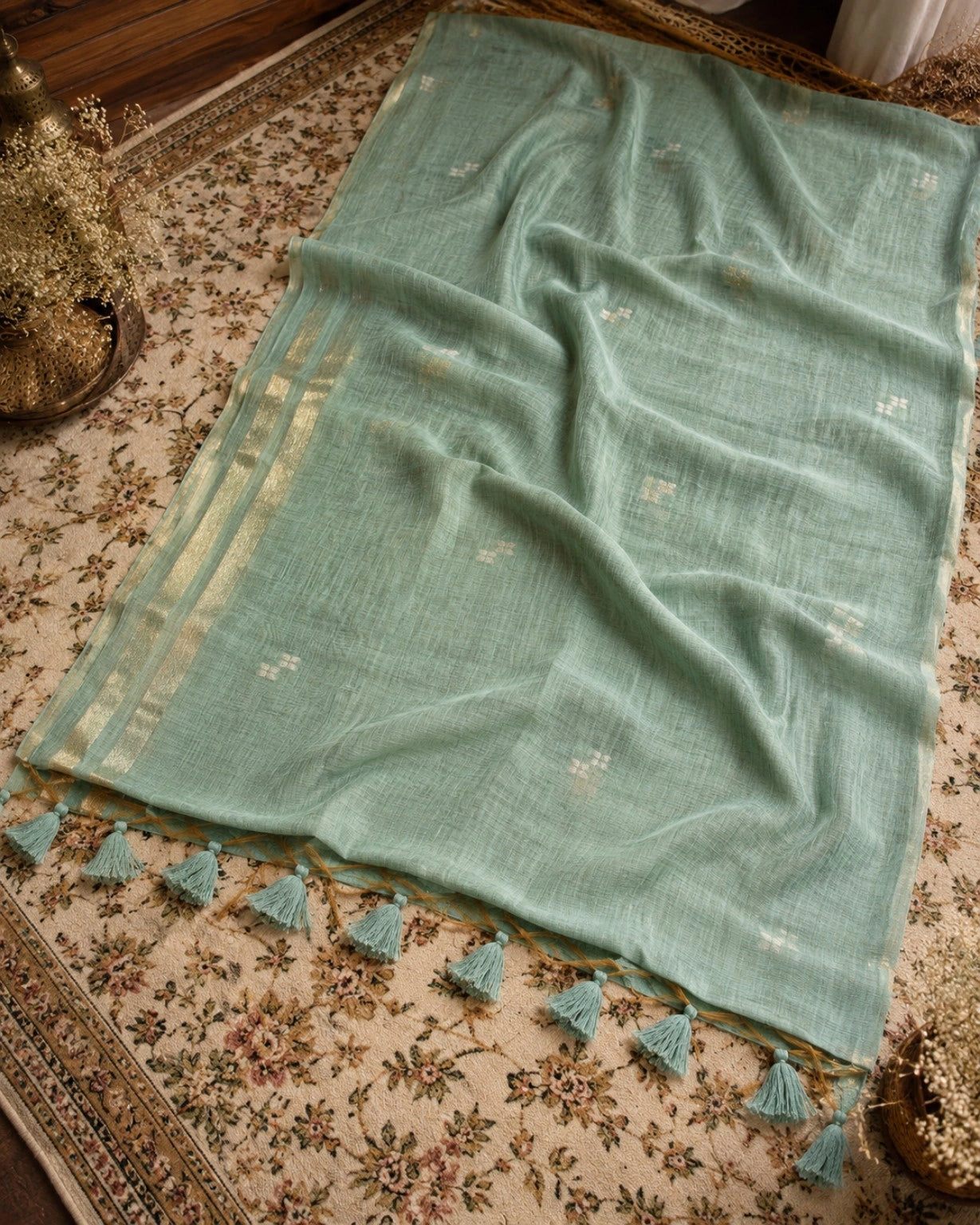 Fancy Silk Jamdani Saree in Sea Green with Delicate Buti Motifs, Golden Woven Border and Tassel Pallu