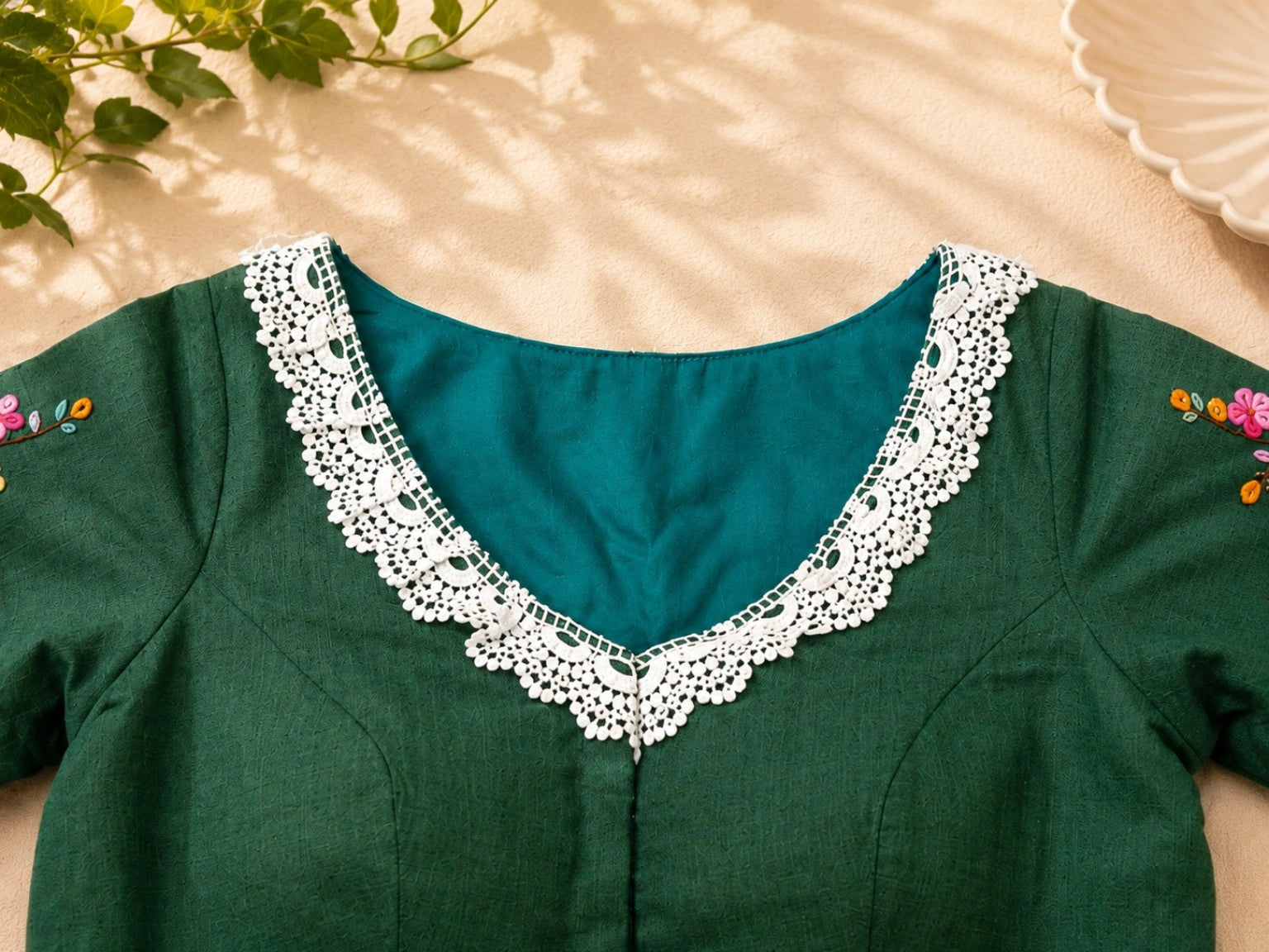 Forest Green Pure Cotton Floral Thread Work Blouse with White Lace Neckline