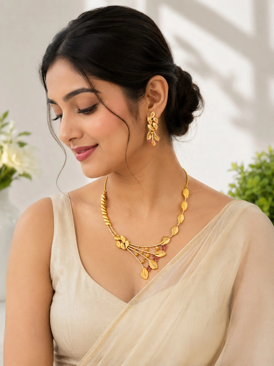 Gold-Tone Leaf Motif Necklace Set with Pink Stone Embellishments