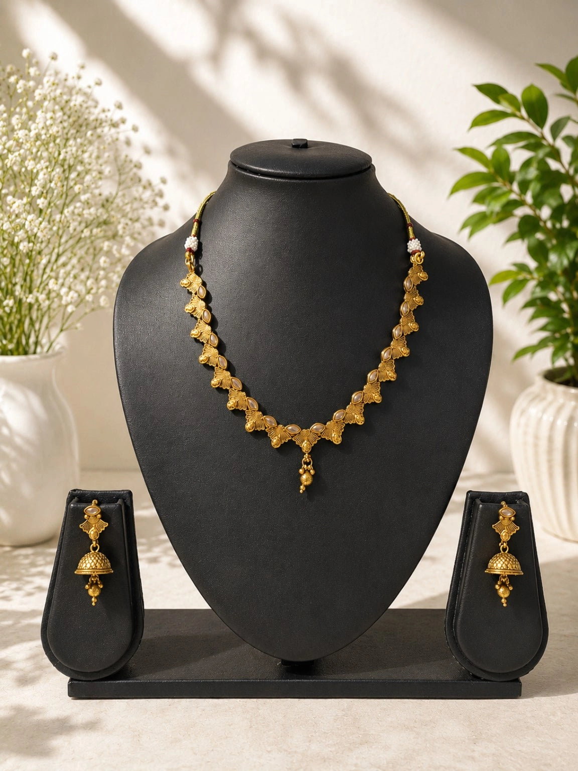 Gold-Tone Floral Leaf Necklace Set with Jhumka Earrings