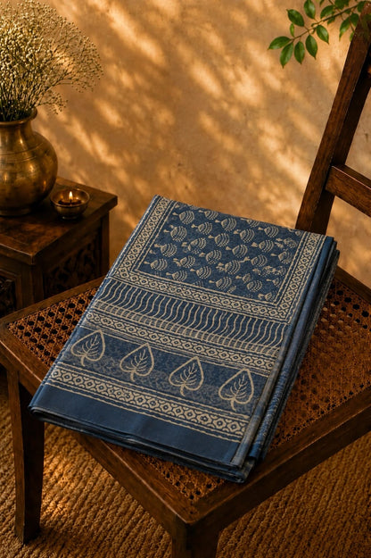 Indigo Blue Linen Printed Saree with Tribal Floral Motifs and Leaf Border Design