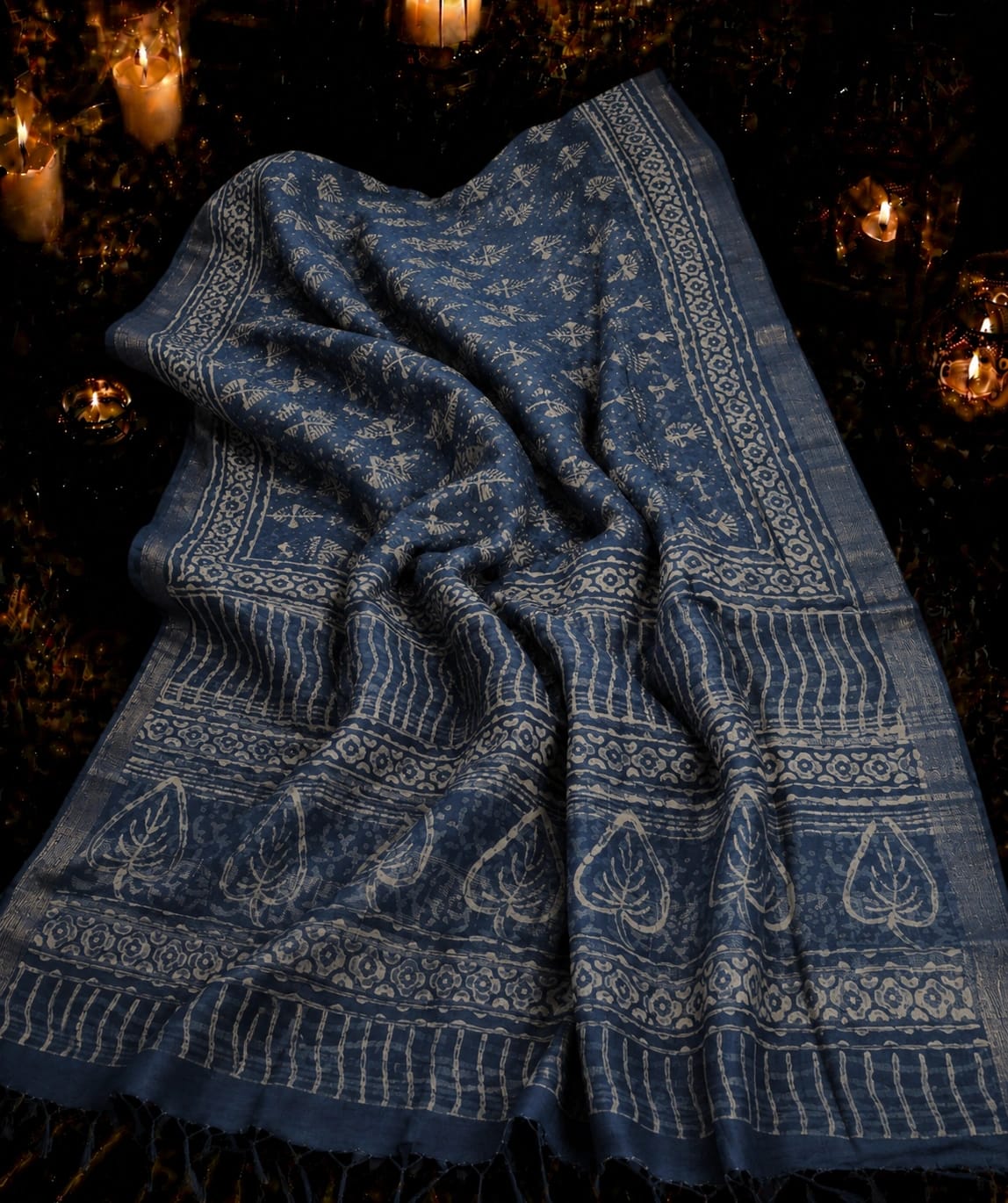 Indigo Blue Linen Printed Saree with Tribal Floral Motifs and Leaf Border Design