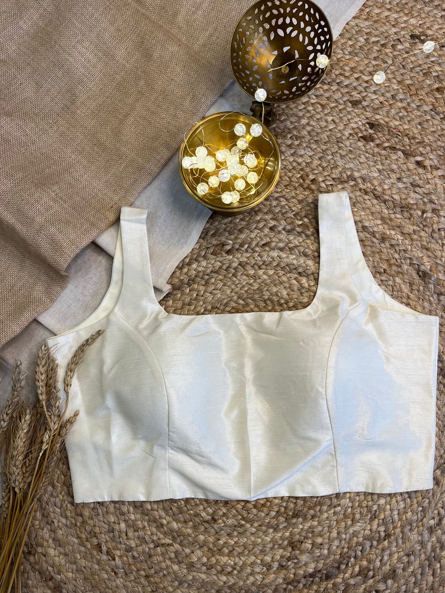 Elegant Ivory Silk Sleeveless Blouse with Refined Grace - WEVOW