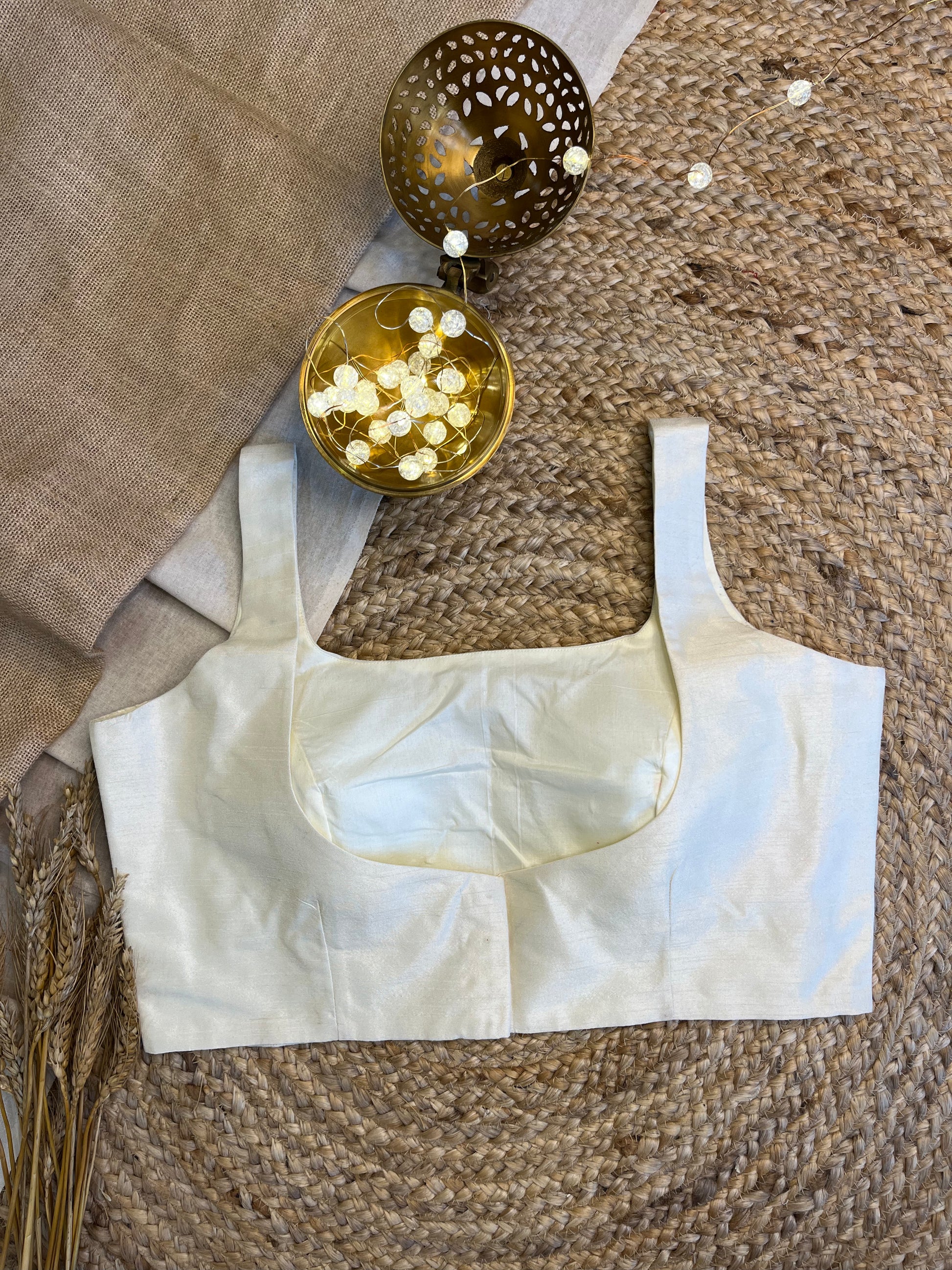 Elegant Ivory Silk Sleeveless Blouse with Refined Grace - WEVOW