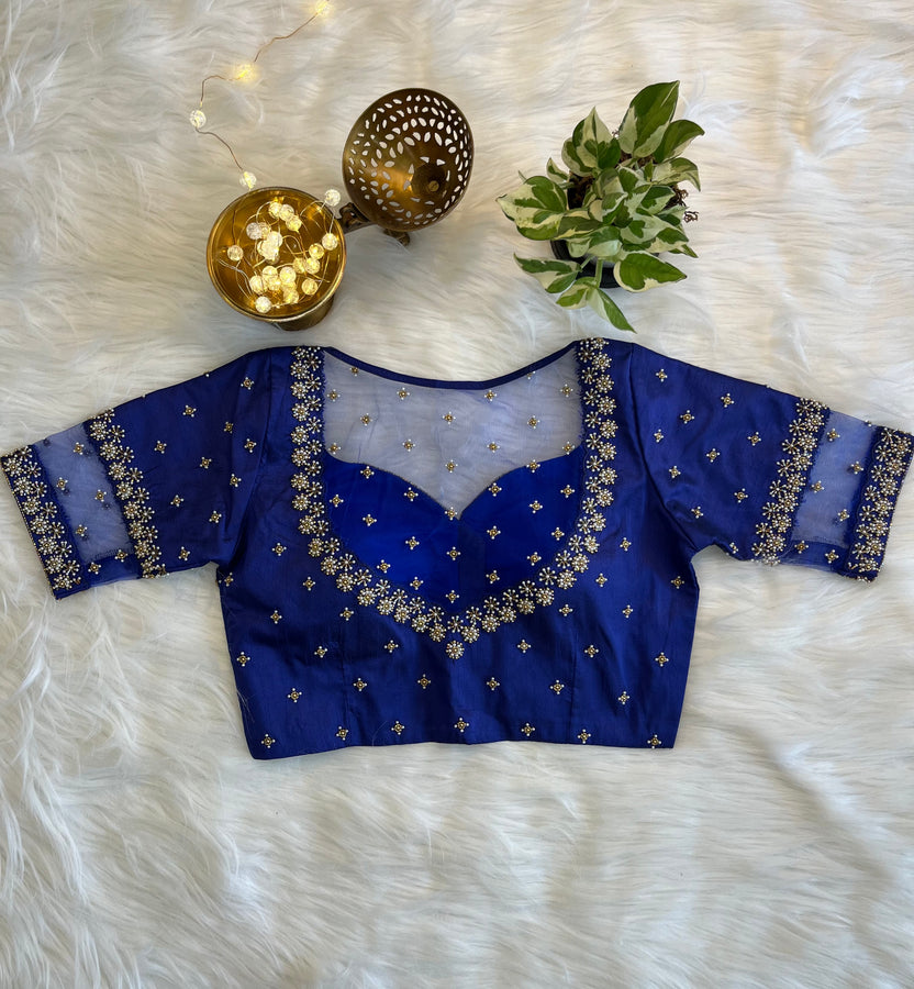 Royal blue designer blouse back design for festive saree styling