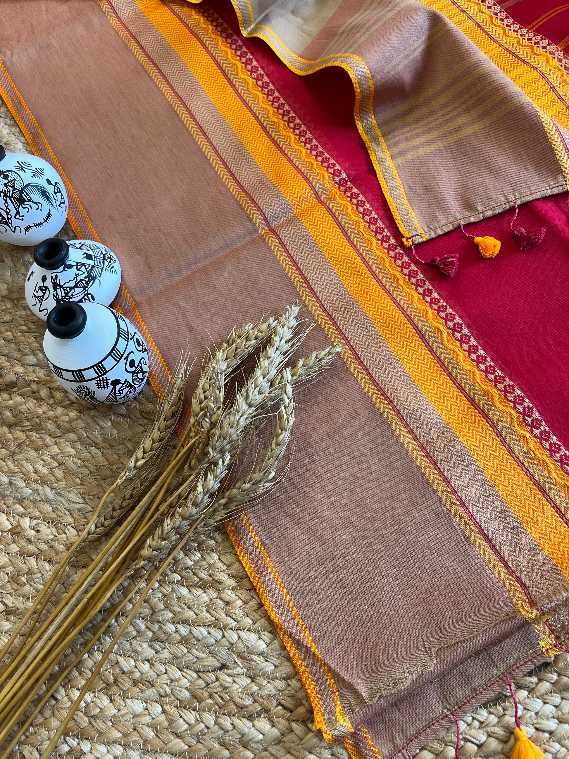 Chic Red Saree with Vibrant Yellow Borders - WEVOW
