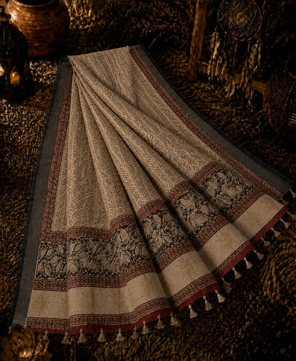 Beige Linen Kalamkari Saree with Tribal Print Body & Artistic Floral Border
