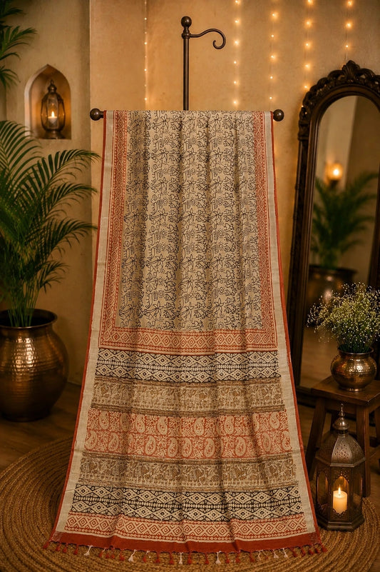 Beige Linen Kalamkari Saree with Tribal Art Print, Paisley Border & Tassel Pallu