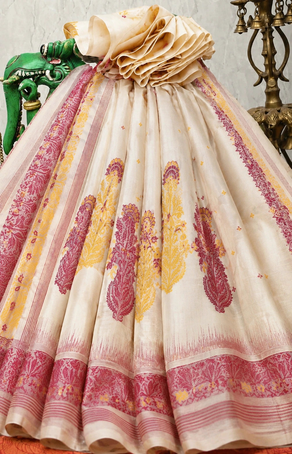 Off-White Cotton Jamdani Ganga Jamuna Border Saree with Pink & Mustard Floral Woven Motifs