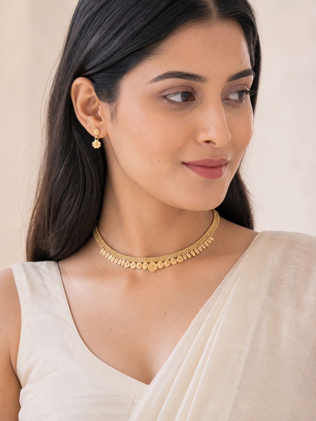 Elegant Floral Gold-Tone Choker Necklace Set with Earrings model photoshoot
