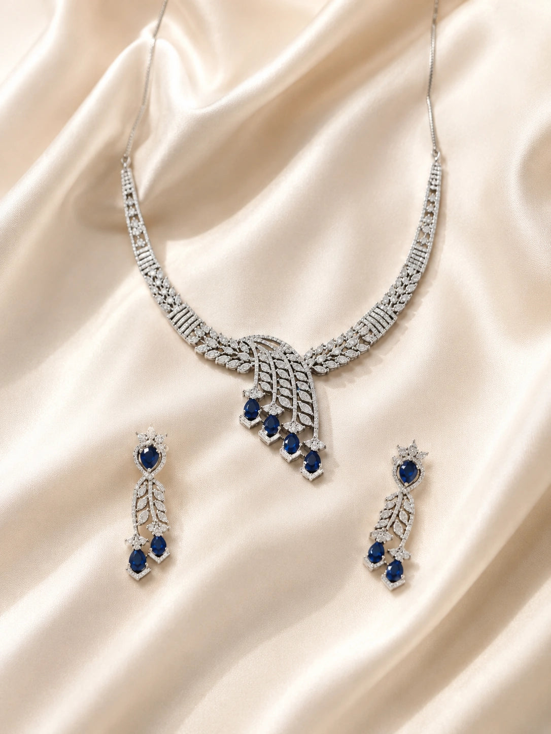 Silver-Tone Leaf Motif Blue Stone Necklace Set with Matching Drop Earrings