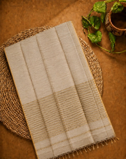 Elegant Beige Linen Zari Saree with Gold Striped Pallu & Subtle Border