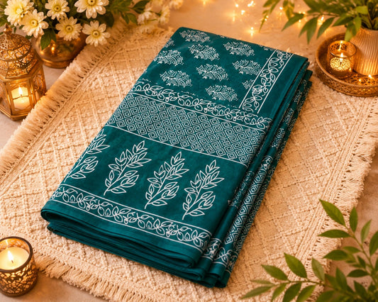 Teal Green Mul Cotton Saree with White Botanical Motifs and Geometric Border Design