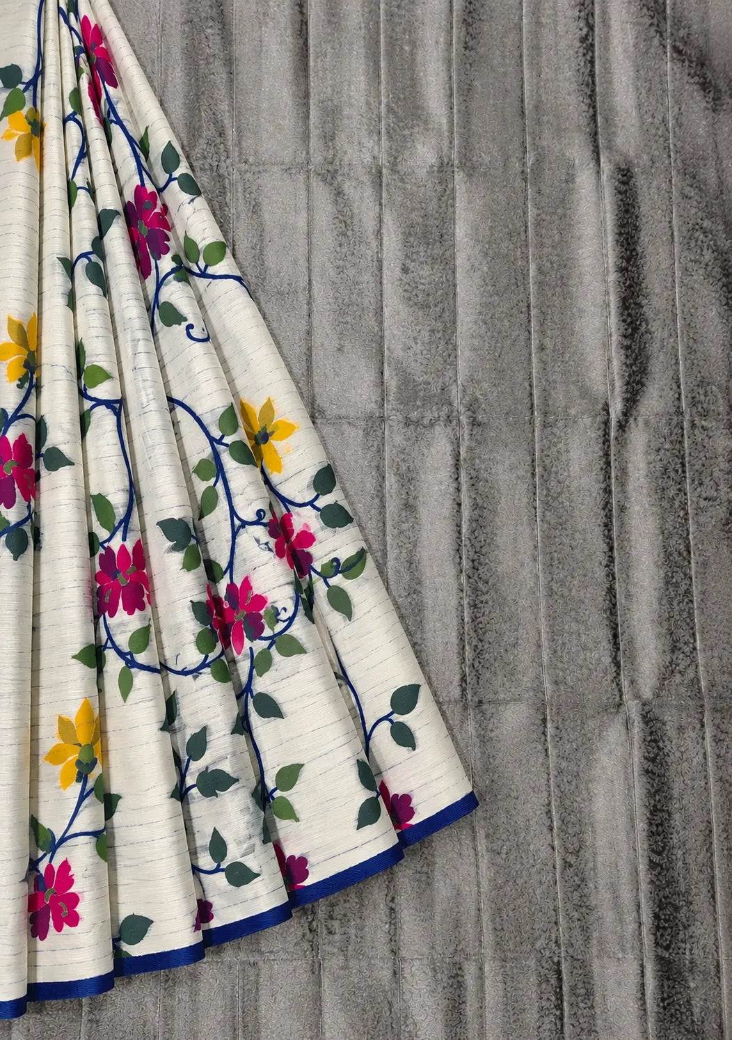 White Muslin Bonolota Saree with Multicolor Floral Vine Print and Royal Blue Border
