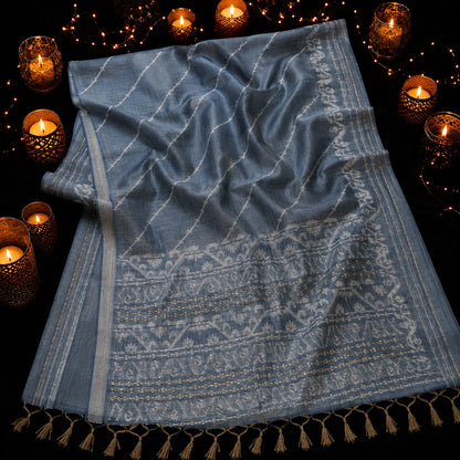 Dusty Blue Silk Jamdani Saree with Silver Woven Floral Border & Elegant Tassels