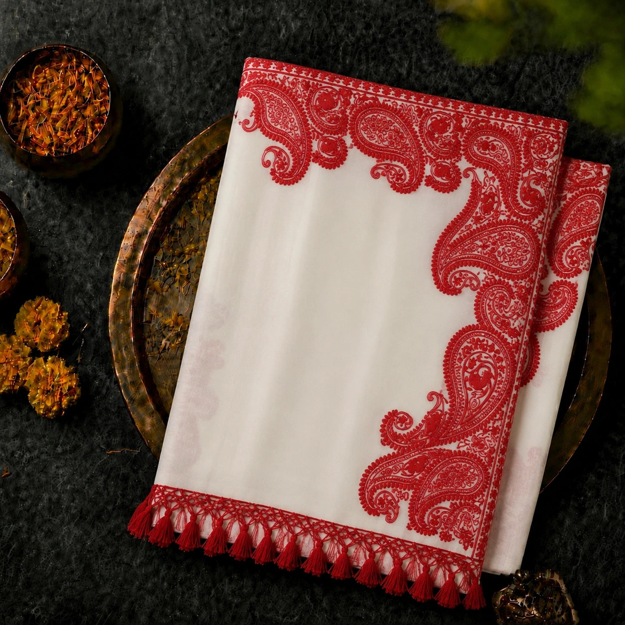 White Soft Georgette Saree with Red Paisley Embroidered Border & Tassel Detailing