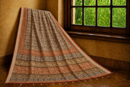 Beige Linen Kalamkari Saree with Tribal Art Print, Paisley Border & Tassel Pallu