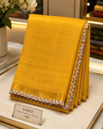 Mustard Yellow Fandy Crush Saree with Decorative Silver Scallop Border
