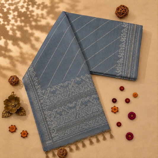 Dusty Blue Silk Jamdani Saree with Silver Woven Floral Border & Elegant Tassels
