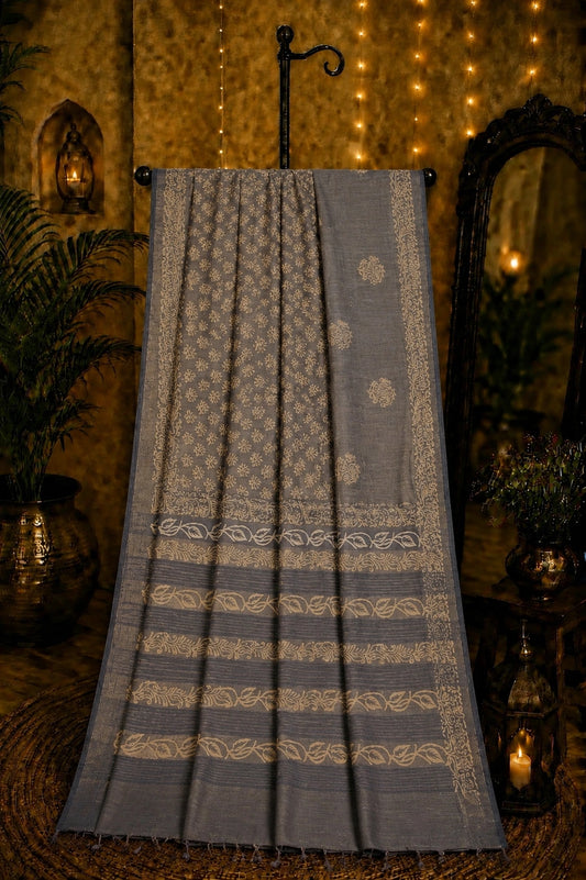 Charcoal Grey Tussar Batik Saree with Beige Floral Motifs and Artistic Border Design
