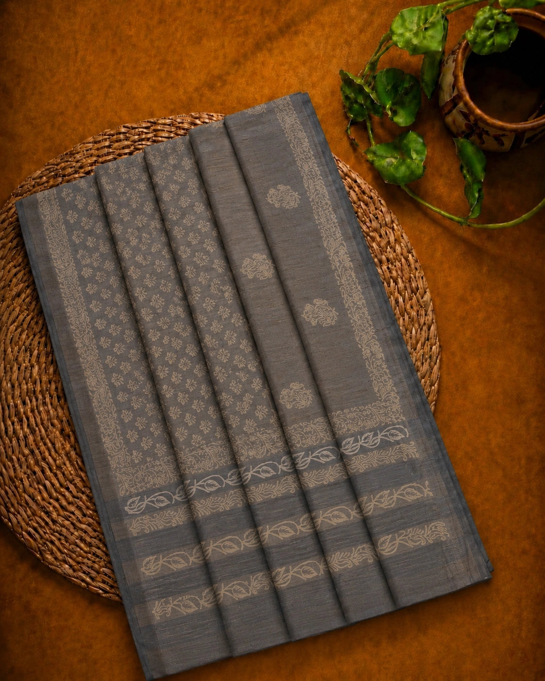 Charcoal Grey Tussar Batik Saree with Beige Floral Motifs and Artistic Border Design