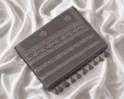 Charcoal Grey Tussar Batik Saree with Beige Floral Motifs and Artistic Border Design